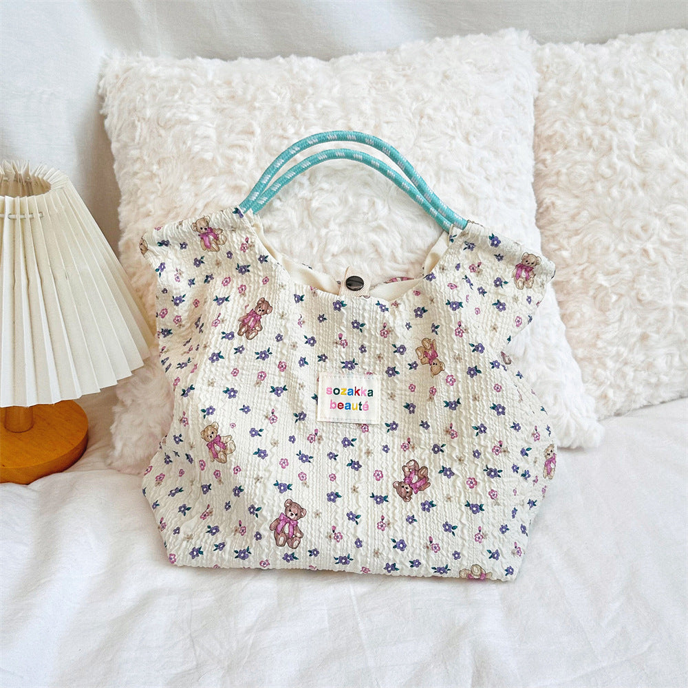 Women's Cartoon Embossed Canvas Large Capacity Portable Handbags