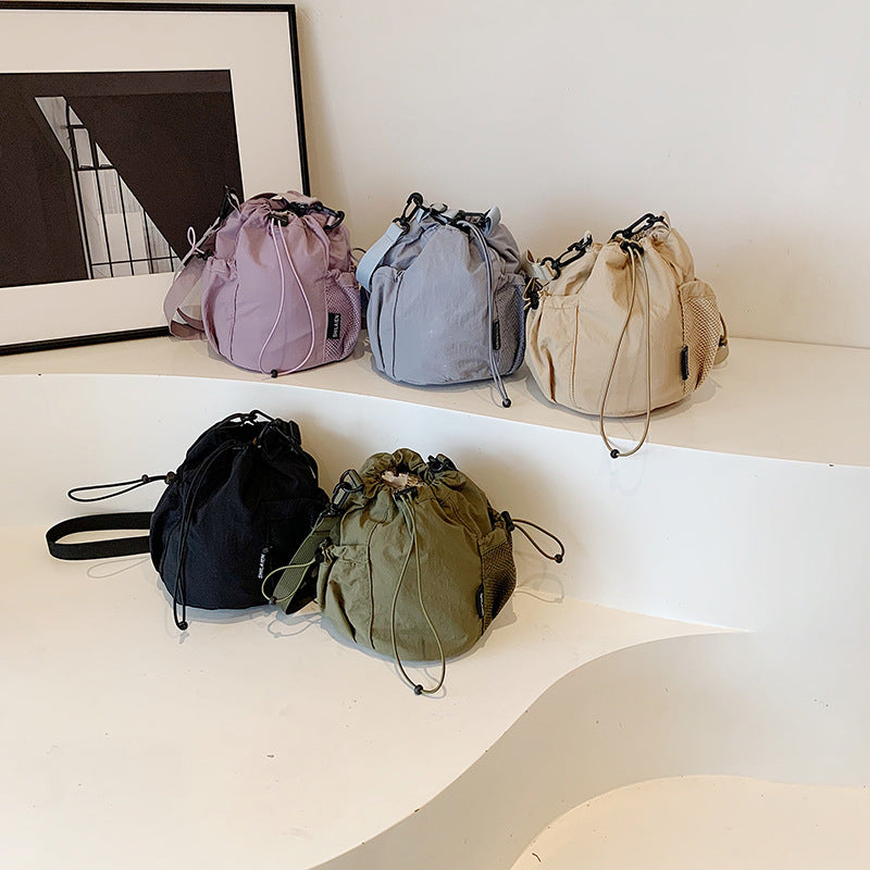 Women's Artistic Drawstring Solid Color Fashion Lightweight Mobile Crossbody Bags