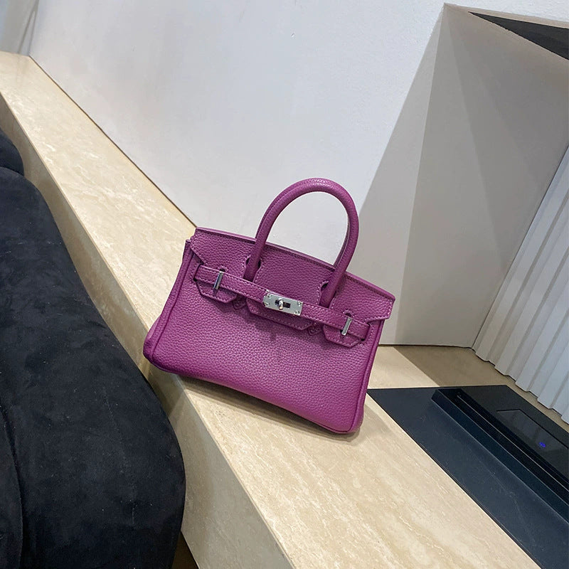 Classic Women's Fashionable Gold Genuine Leather Handbags