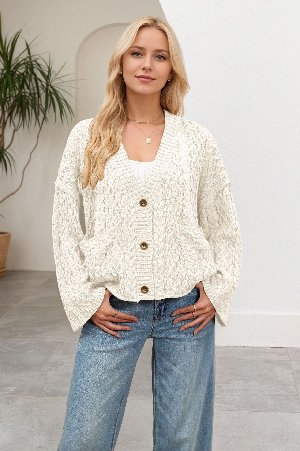 Solid Color Twist Single-breasted Double Pocket Sweaters