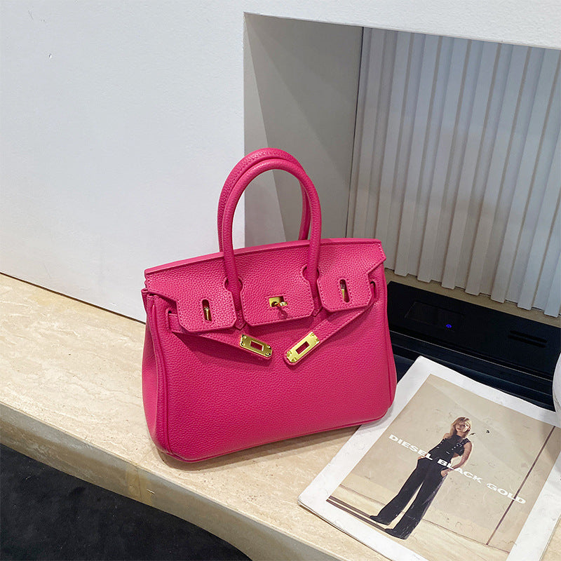 Classic Women's Fashionable Gold Genuine Leather Handbags