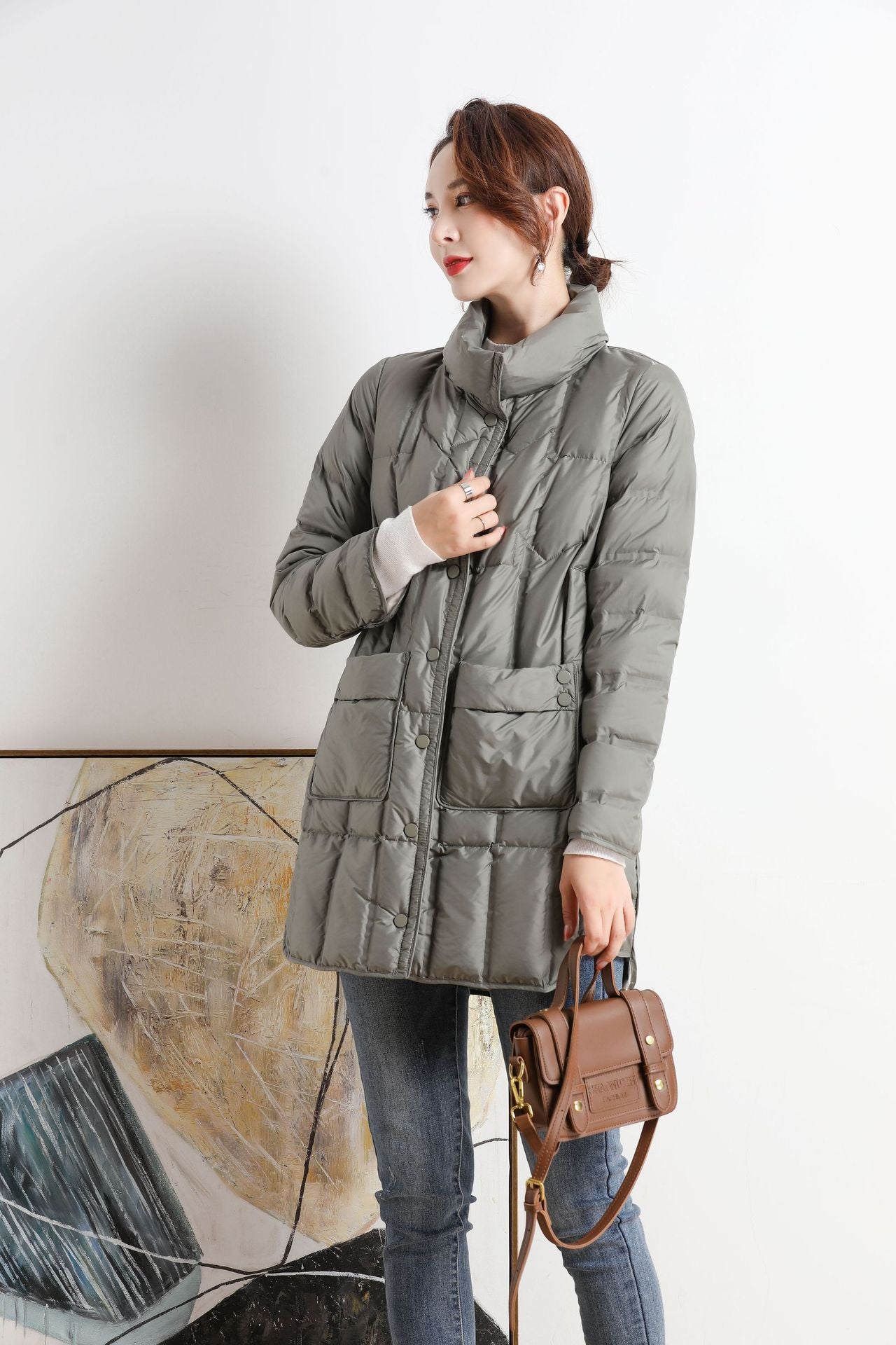 Women's Seamless Adhesive Veet Down Lightweight Mid-length Jackets