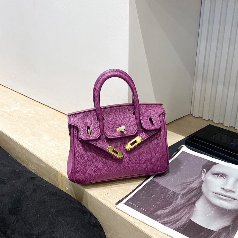 Classic Women's Fashionable Gold Genuine Leather Handbags