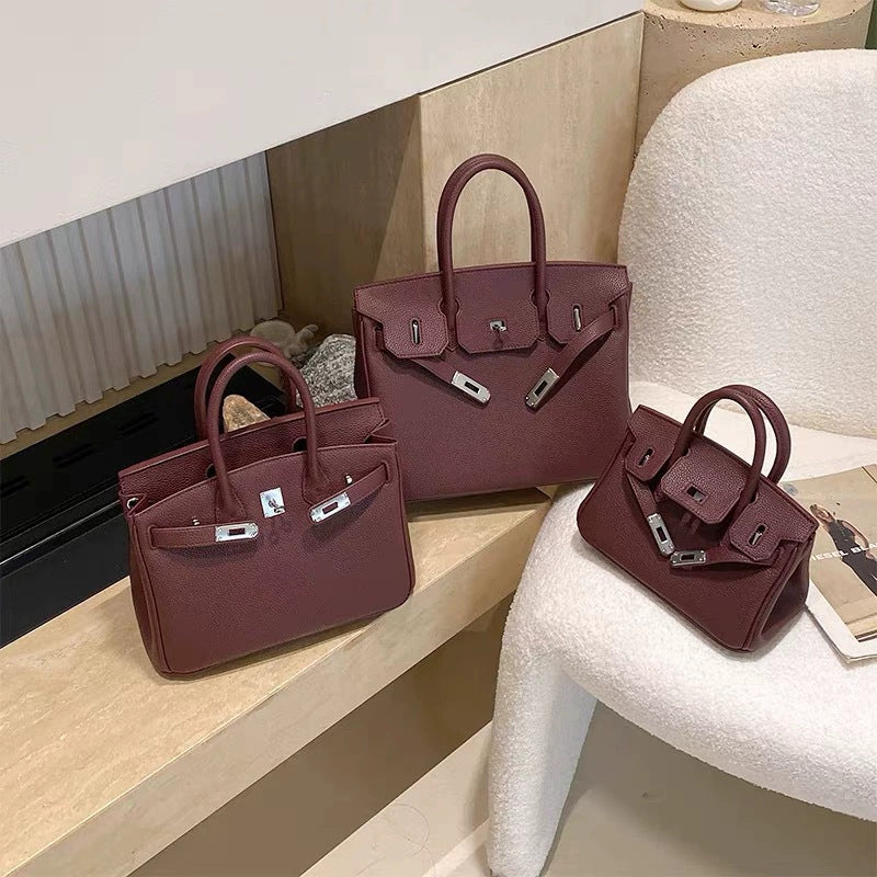 Classic Women's Fashionable Gold Genuine Leather Handbags