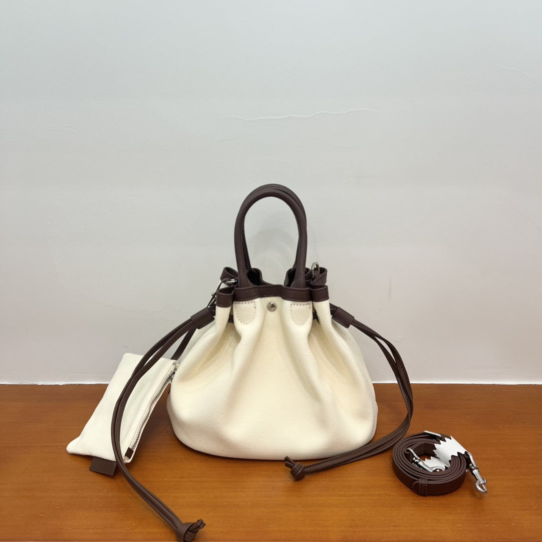 Cowhide Simple Contrast Color Large Capacity Handbags