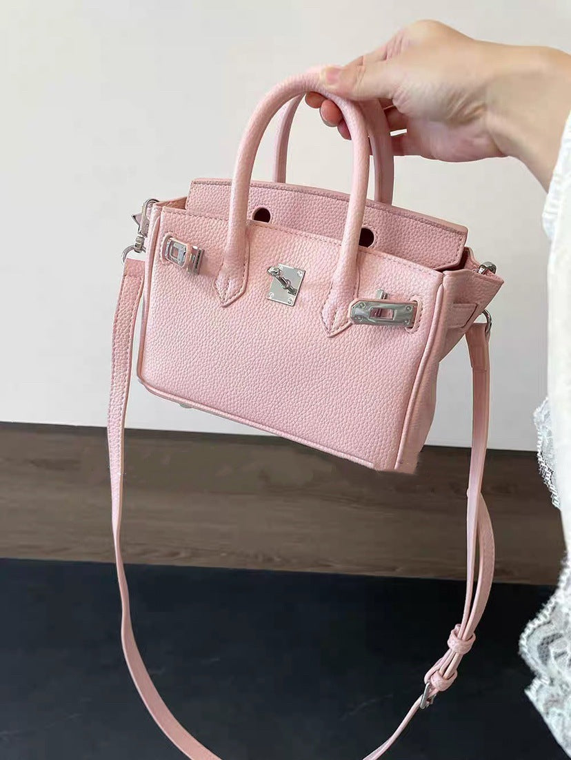 Classic Women's Fashionable Gold Genuine Leather Handbags