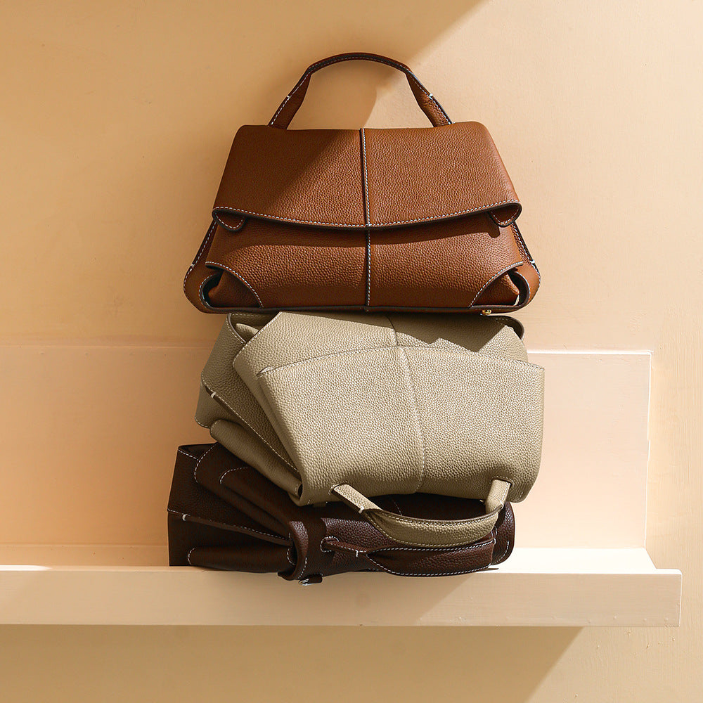 Women's Leather Cowhide Simple Style Commuter Push Handbags