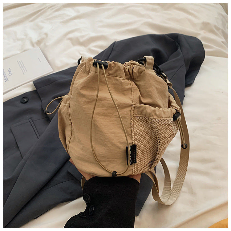 Women's Artistic Drawstring Solid Color Fashion Lightweight Mobile Crossbody Bags