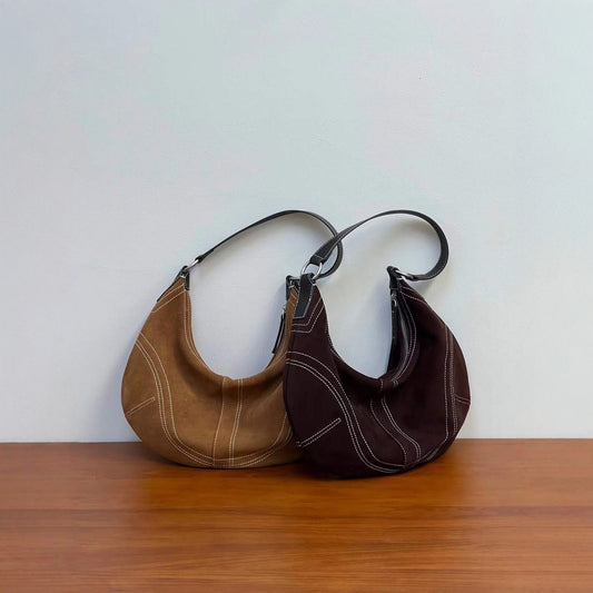 Women's Cowhide Solid Color Stitching Dumpling Armpit Bags