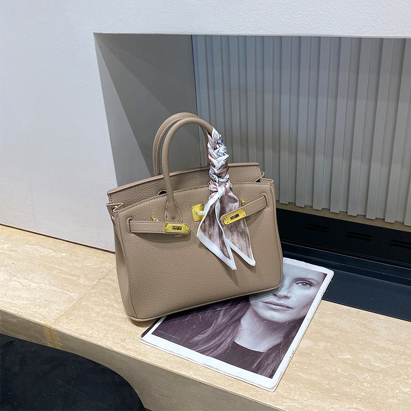 Classic Women's Fashionable Gold Genuine Leather Handbags