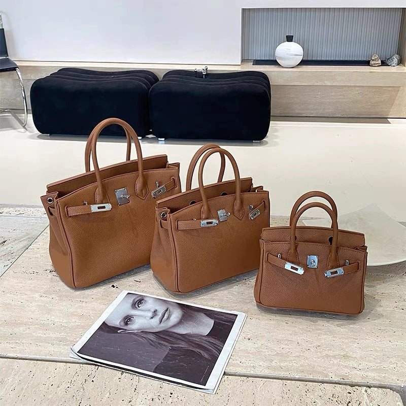 Classic Women's Fashionable Gold Genuine Leather Handbags