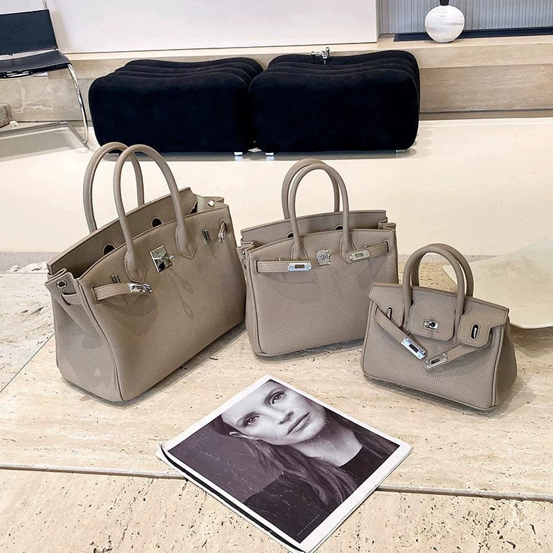 Classic Women's Fashionable Gold Genuine Leather Handbags