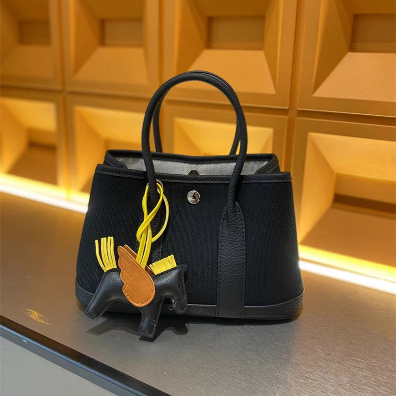 Attractive Women's Canvas Personality First Layer Handbags