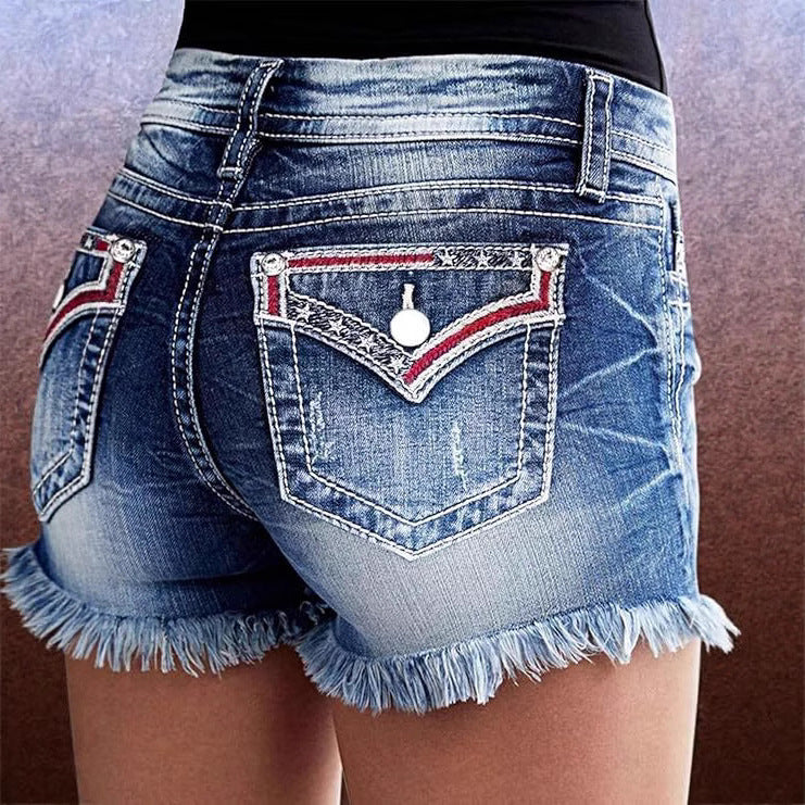 Women's Design Fashion Tassel Perforated Denim Shorts