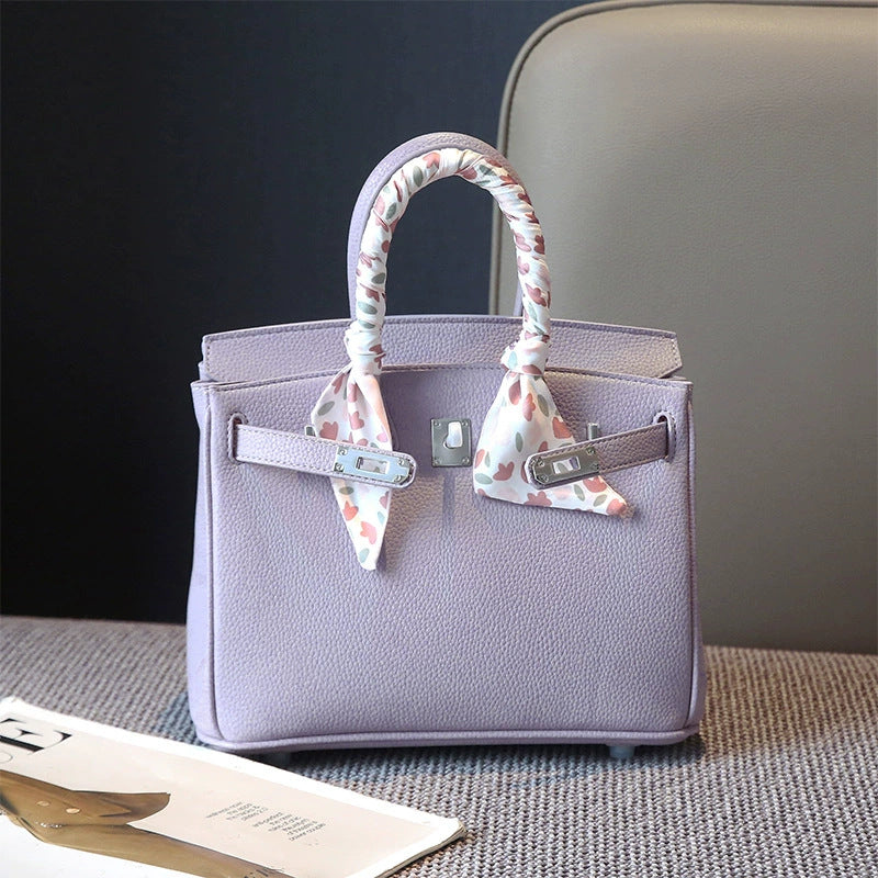 Classic Women's Fashionable Gold Genuine Leather Handbags