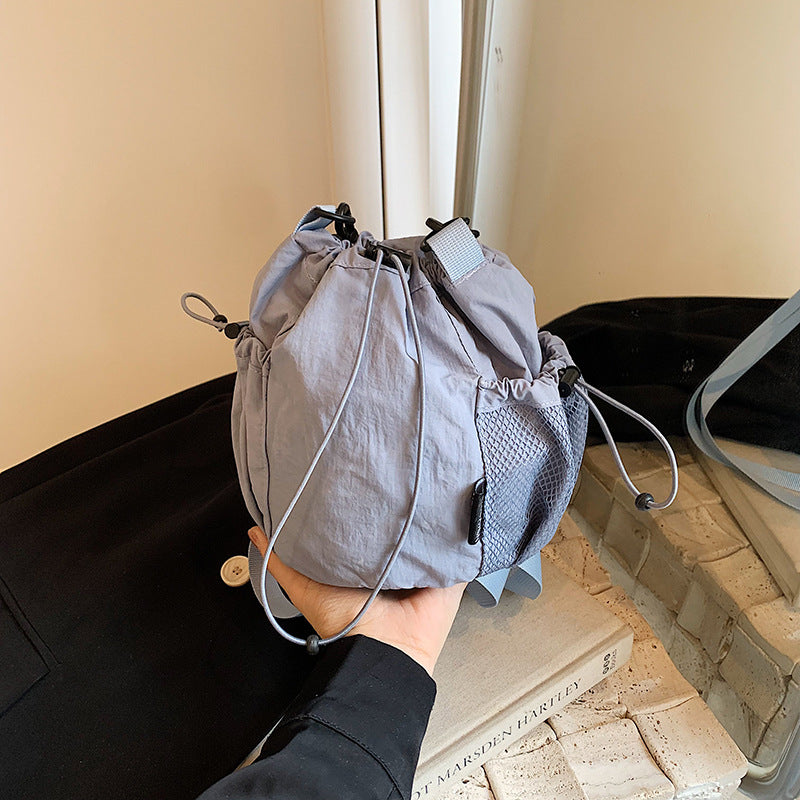 Women's Artistic Drawstring Solid Color Fashion Lightweight Mobile Crossbody Bags