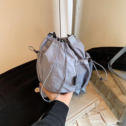 Women's Artistic Drawstring Solid Color Fashion Lightweight Mobile Crossbody Bags