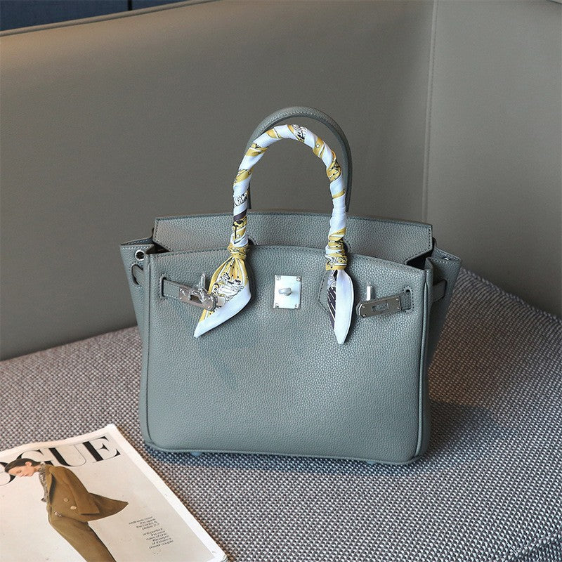 Classic Women's Fashionable Gold Genuine Leather Handbags