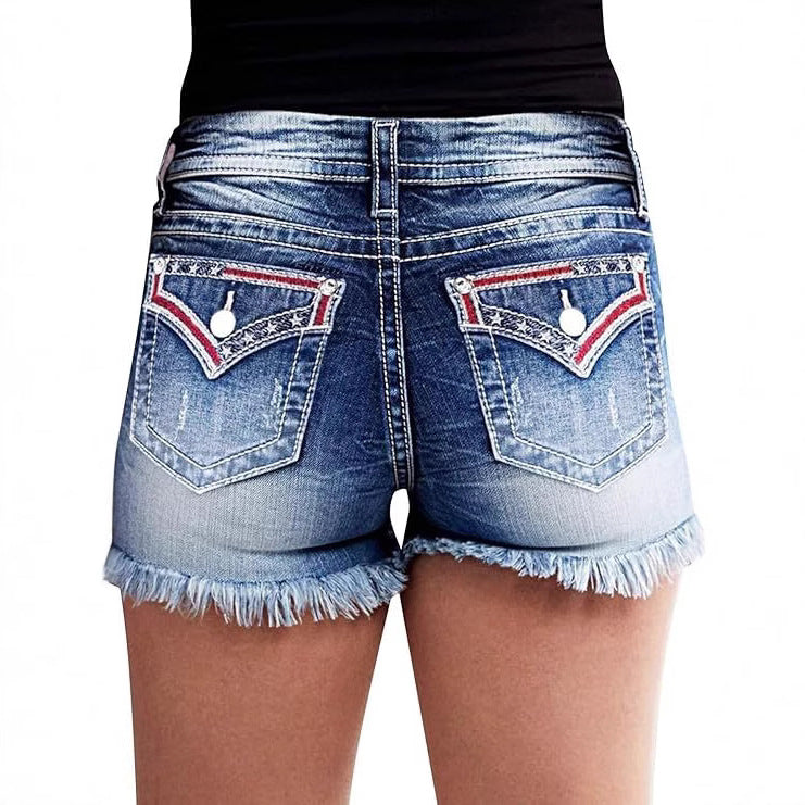 Women's Design Fashion Tassel Perforated Denim Shorts