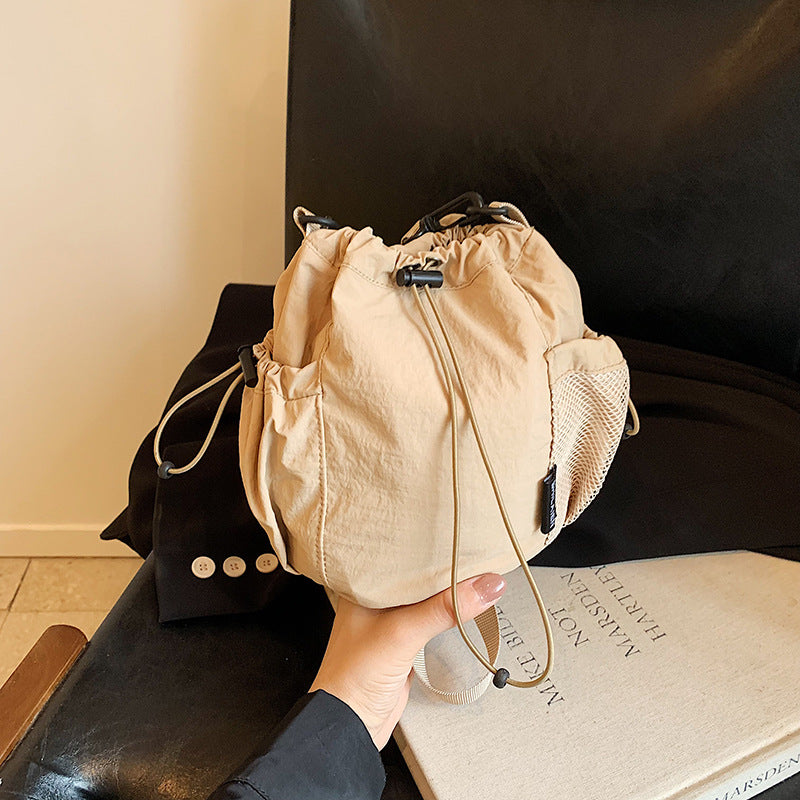 Women's Artistic Drawstring Solid Color Fashion Lightweight Mobile Crossbody Bags